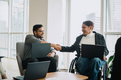Employees shaking hands